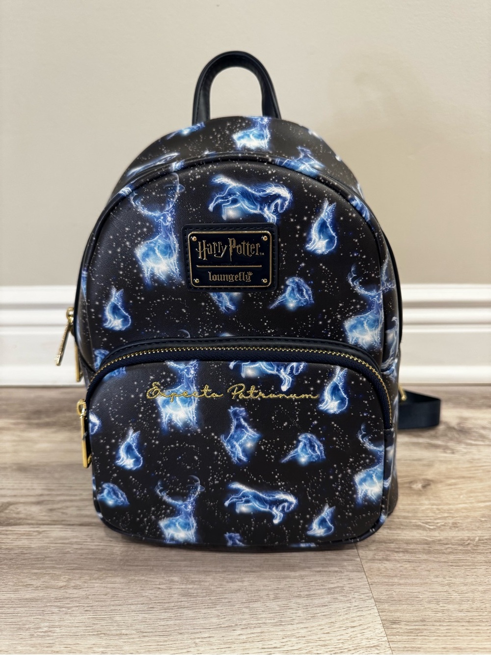 Loungefly Harry Potter Black Backpack with Blue Patronus Print